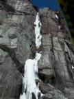 The crux of the first pitch is a thin ice column protected with rock gear on the sides