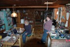 Tom and Nona having dessert in the kitchen after a day of ice climbing