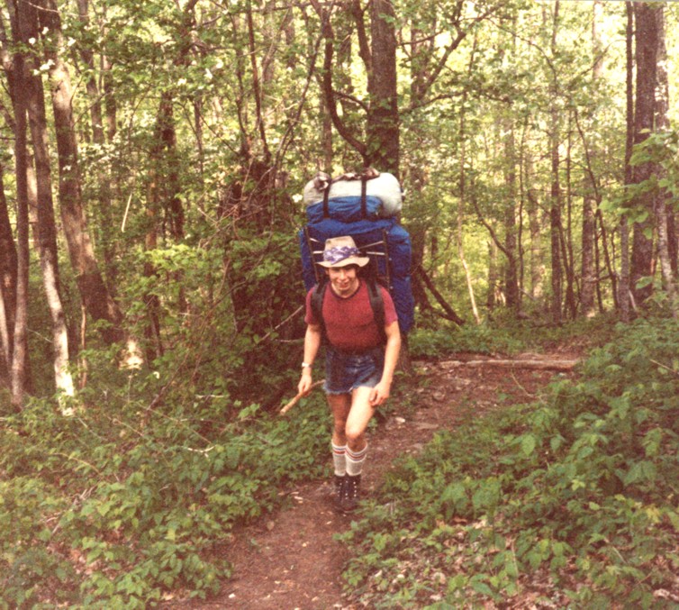 Tracy carrying a monster load in a Trailwise frame pack, somewhere in the deep south