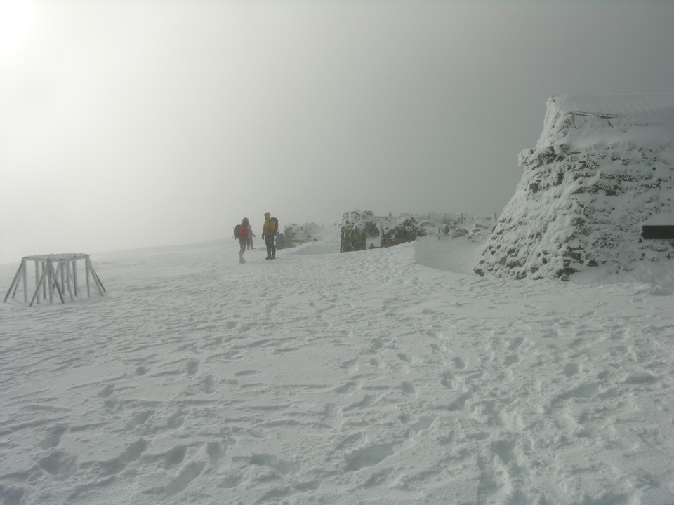 White out on the summit; Jim is the tall person on the right
