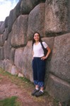 Lucie in front of some fancy Inca stonework