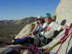 Eric and Lucie lounging at the belay at sunset