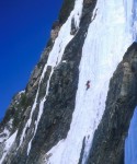 Close-up of climber leading the second pitch of the Gentleman in fat conditions