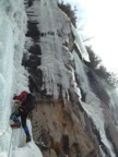 Tommy takes the right-hand line of ice on the top pitch