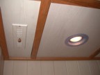 Hand made heating register (that closes) and recessed light in the basement bathroom