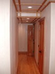 Hallway leading to the flat files; doors on the right lead to walk-in cedar closets