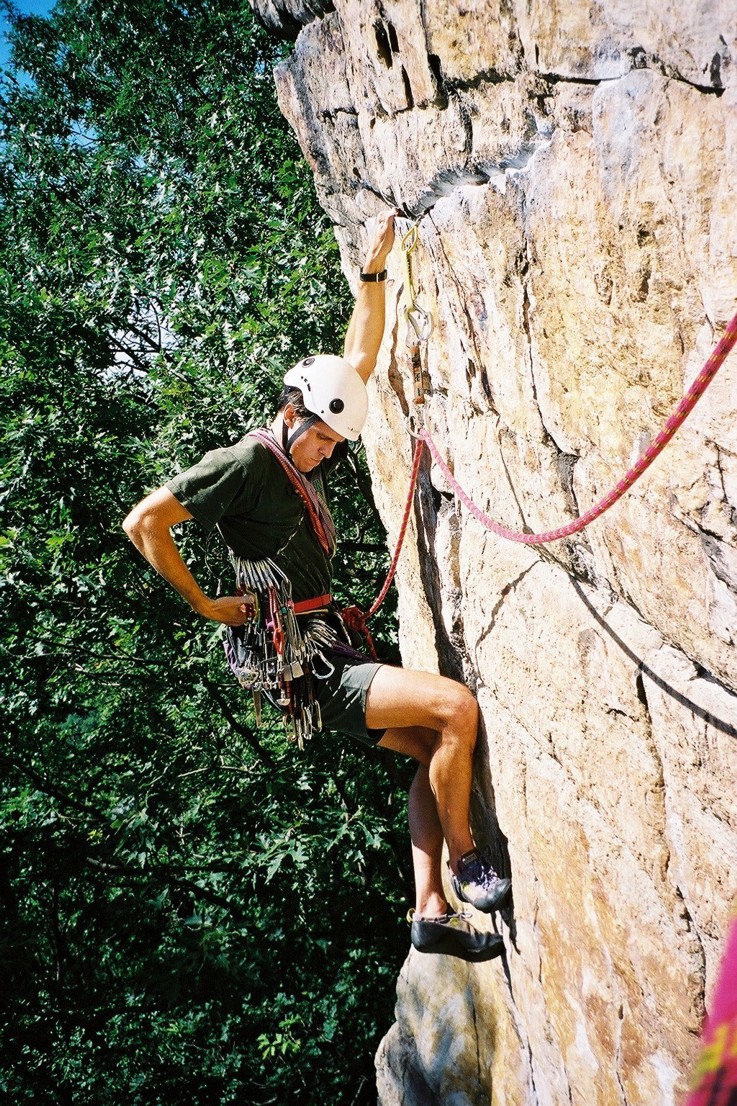 Selecting gear to place into the horizontal crack at the crux