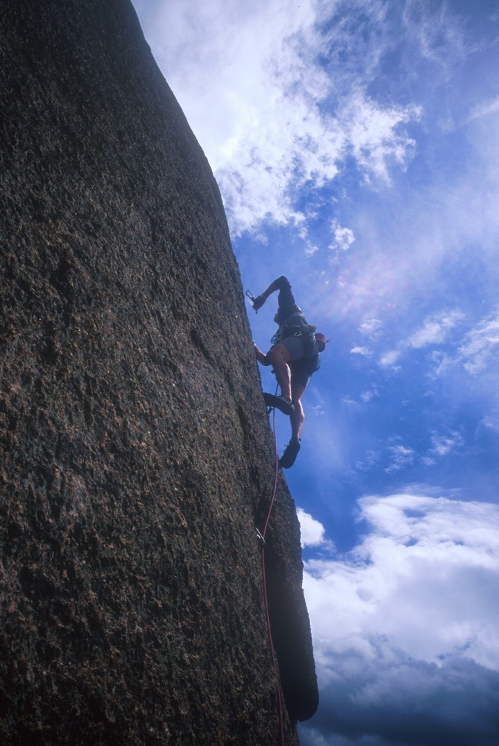 Climbing the thin face on the third pitch