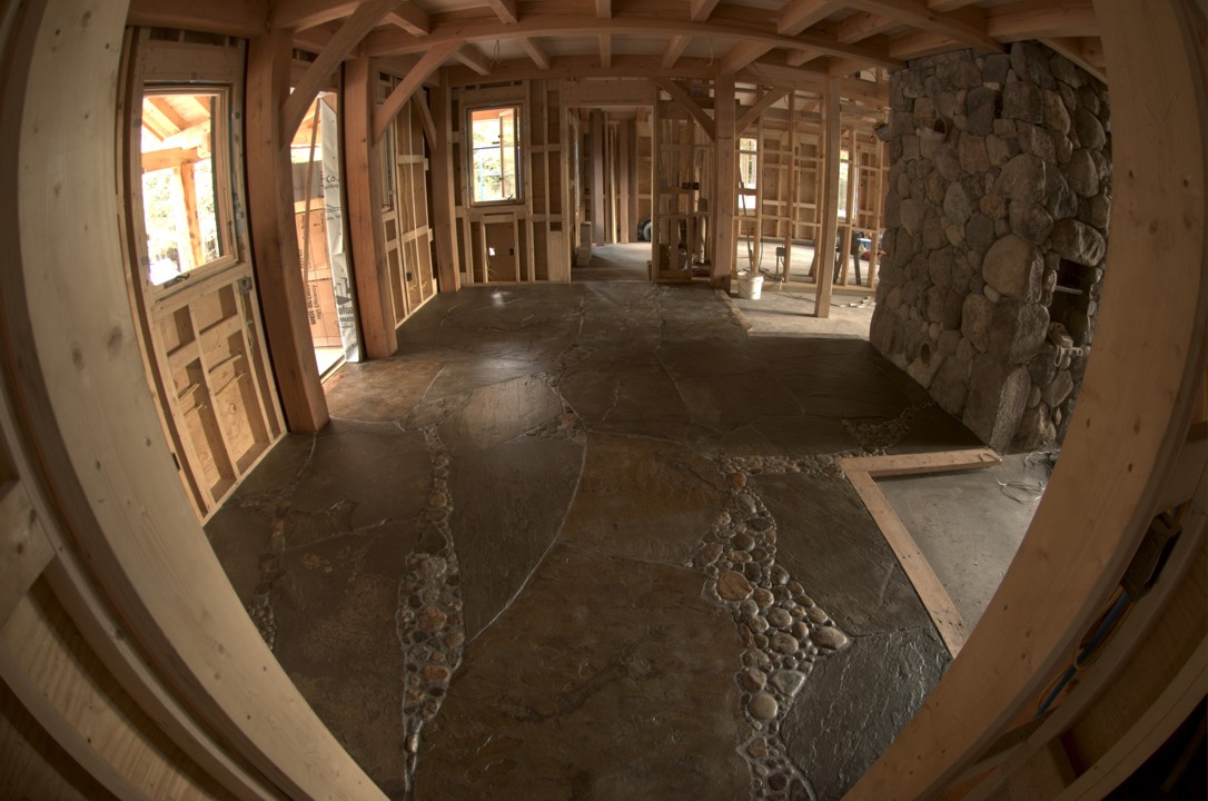 The finished (and sealed) stone floor as seen from the bathroom door