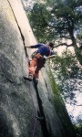 Climbing a great layback flake in the Valley