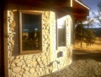 The "Mother Ship" is a cordwood masonery house made using wood cut from forest service land in East Rosebud Canyon